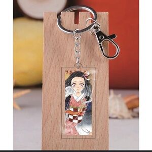 Anime Demon Slayer Character Keychain with Red and Blue Accents